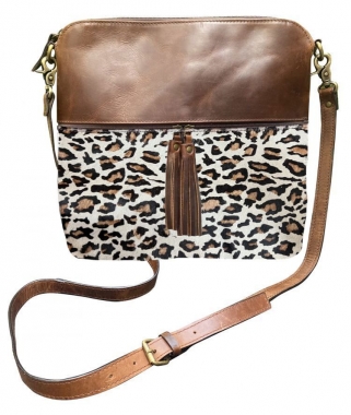 Klassy Cowgirl Leather Crossbody Bag with hair on cowhide w/ barrel racer brand.